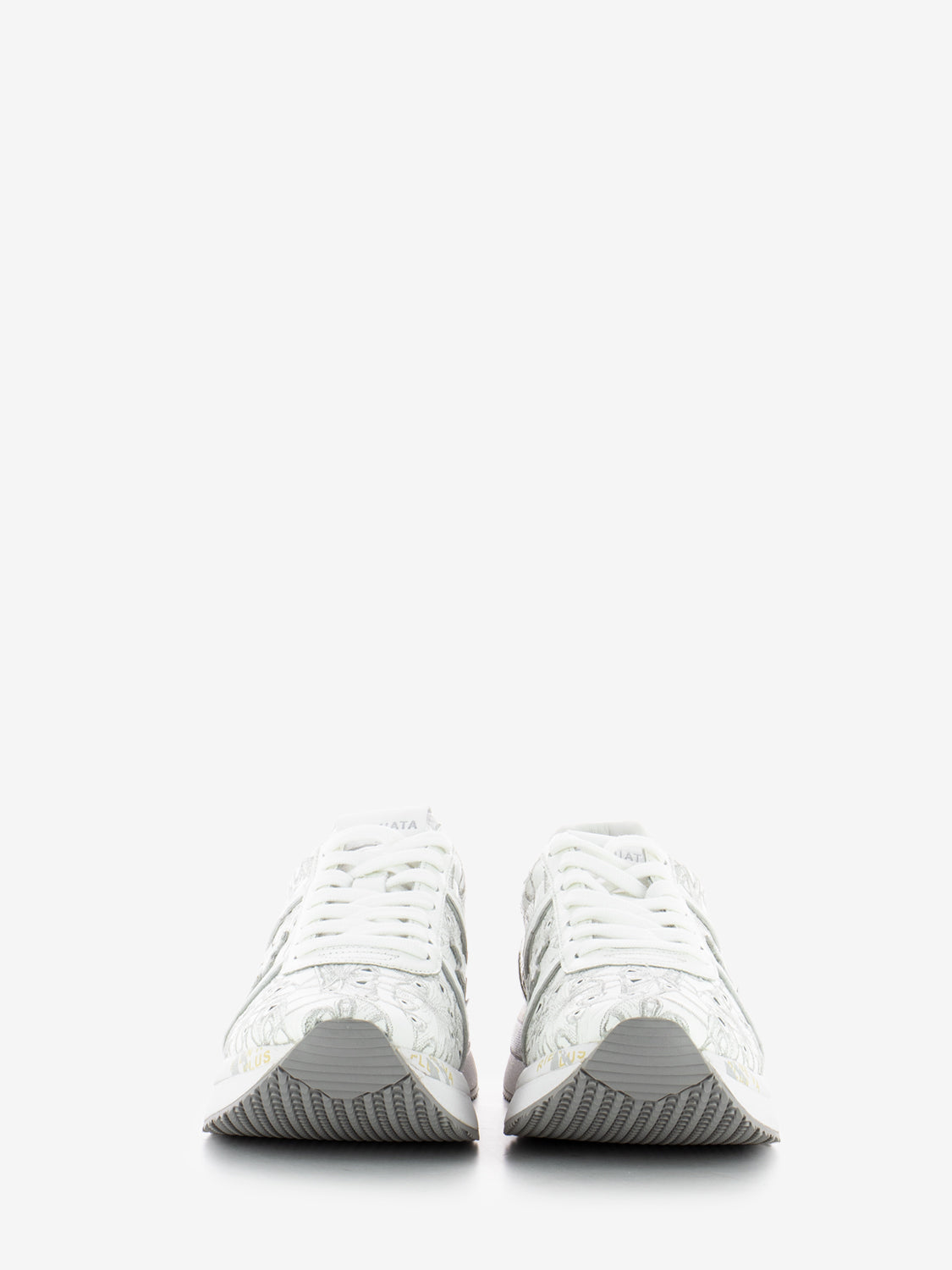 Conny white sneakers