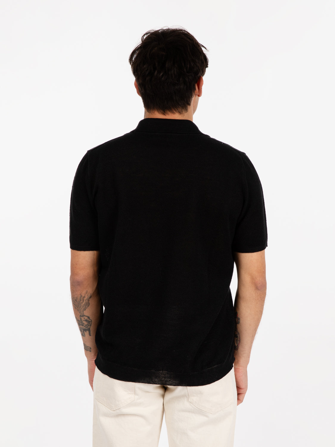 Black piquet stitch short sleeve polo shirt