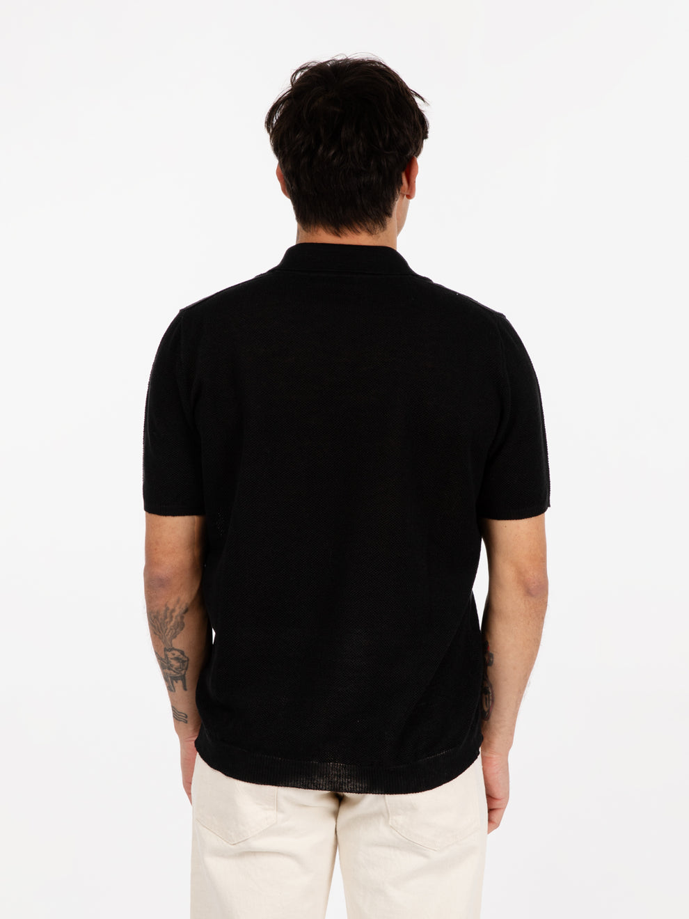 Black piquet stitch short sleeve polo shirt
