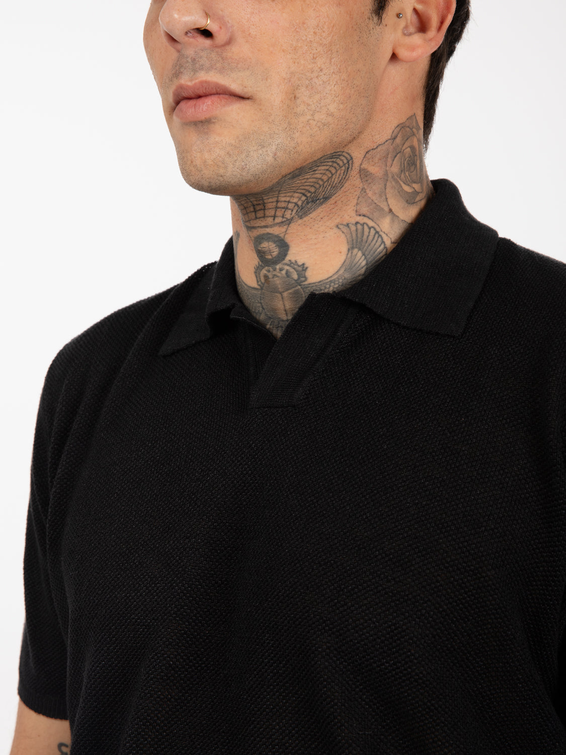Black piquet stitch short sleeve polo shirt