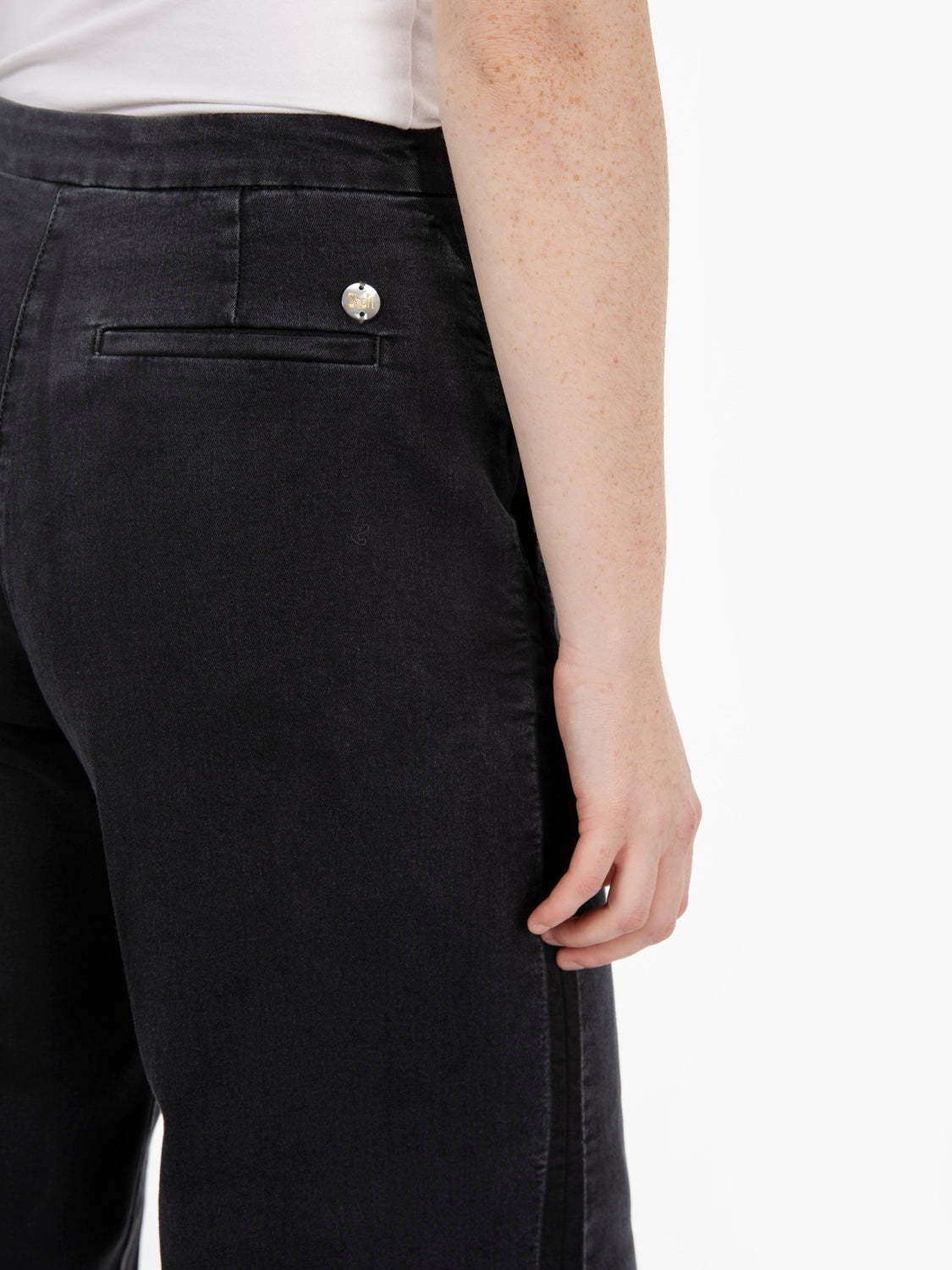 Jeans Flaire smocking over black used