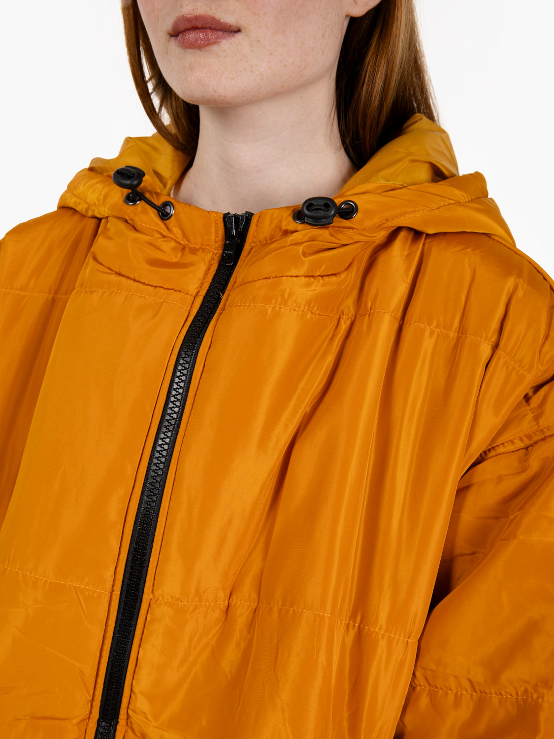 Long down jacket in solid curry color