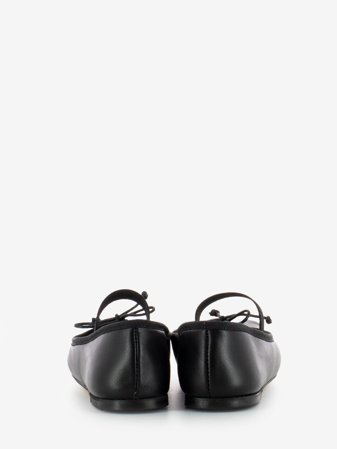 Ballerina with black elastic tassel