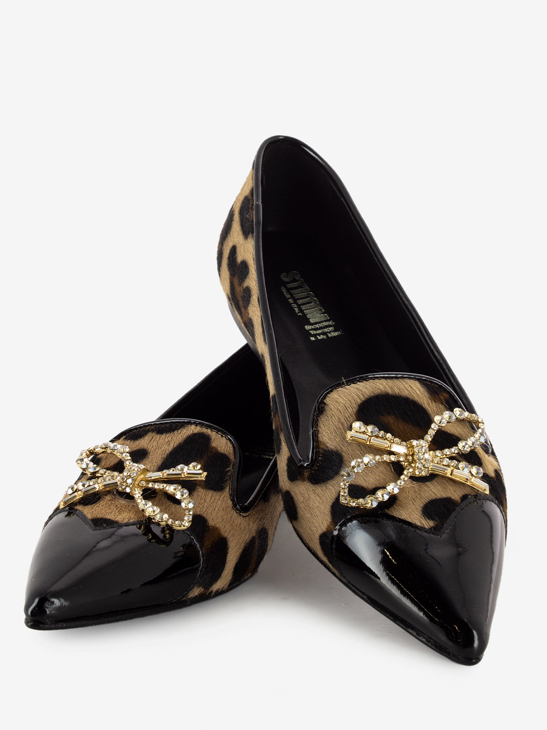 Animal print ponyskin ballerinas with black patent toe