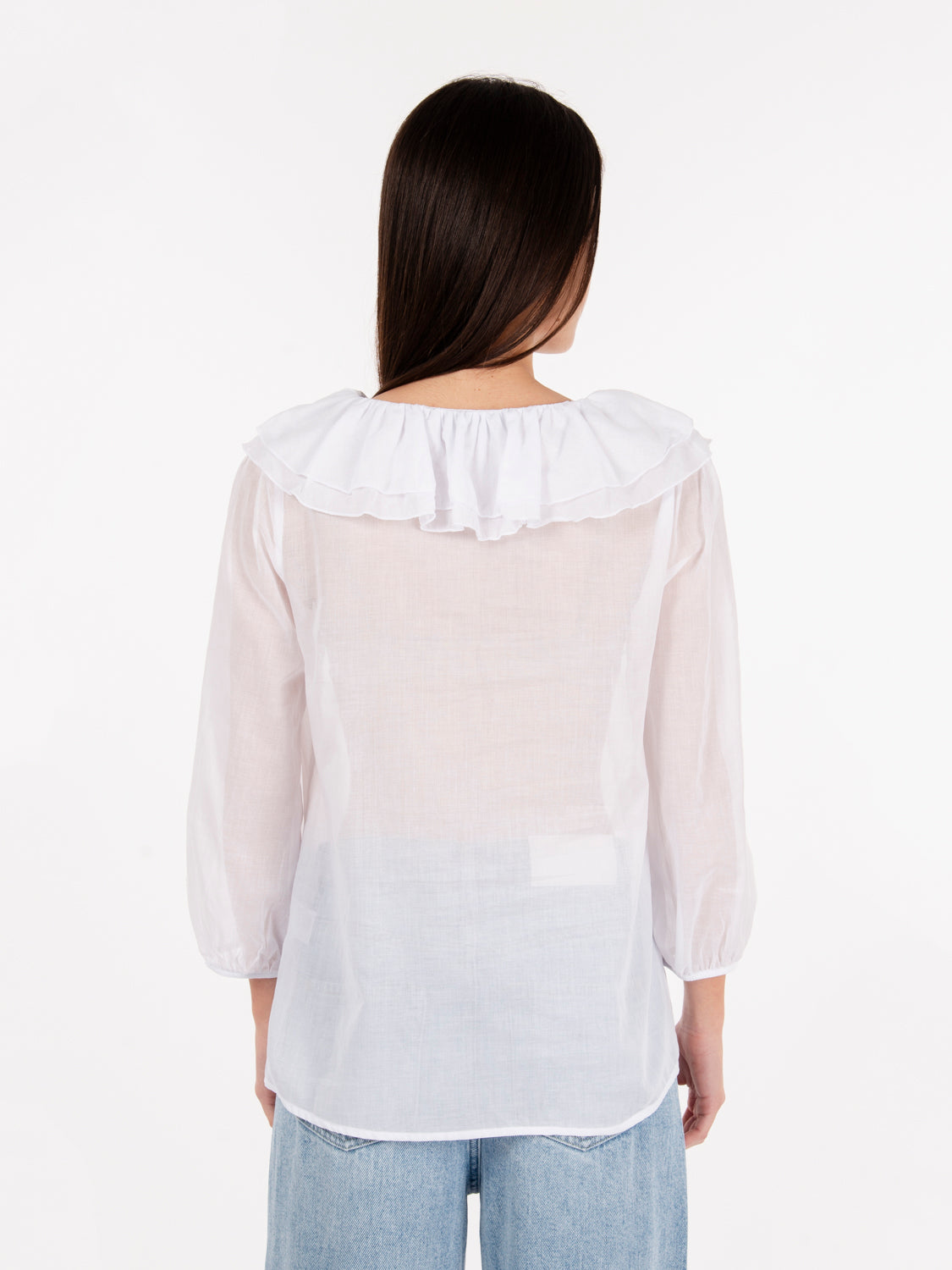 Camicia con volant in mussola bianca