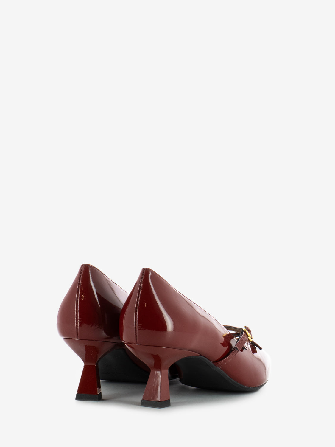 Low red patent leather pumps