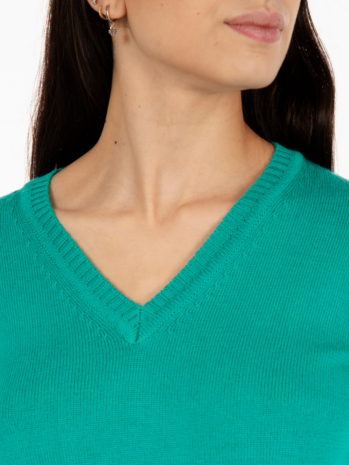 Green V-neck wool sweater