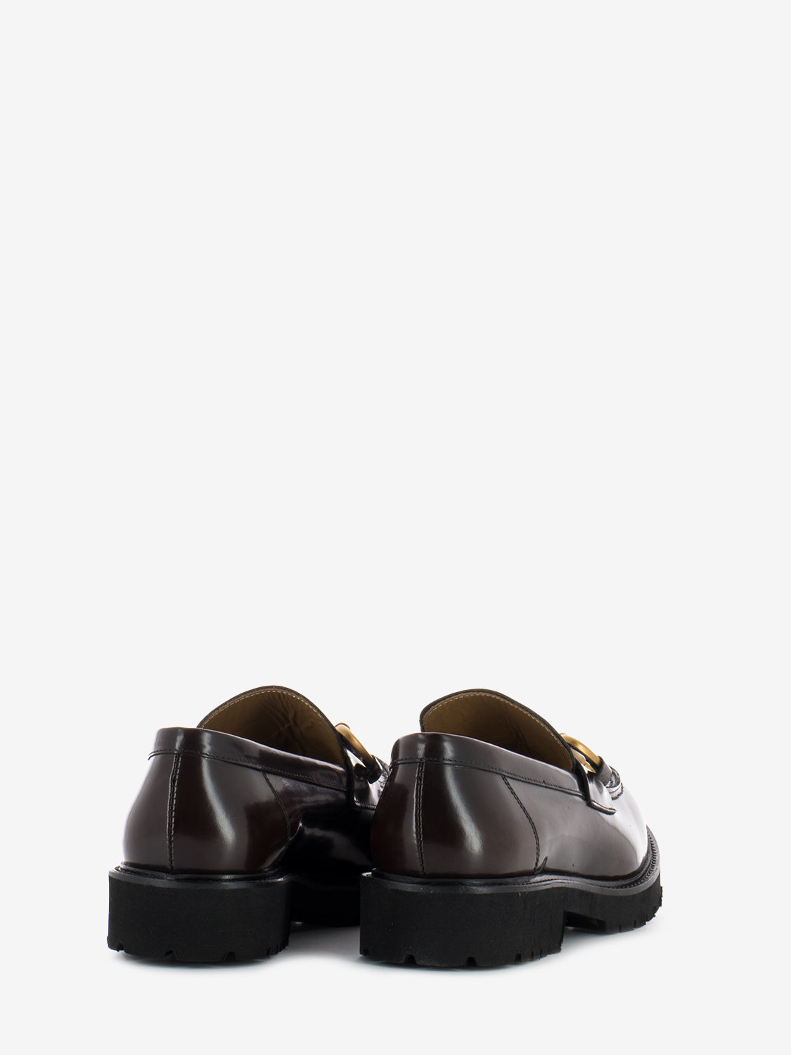 Moccasins with dark brown clamp