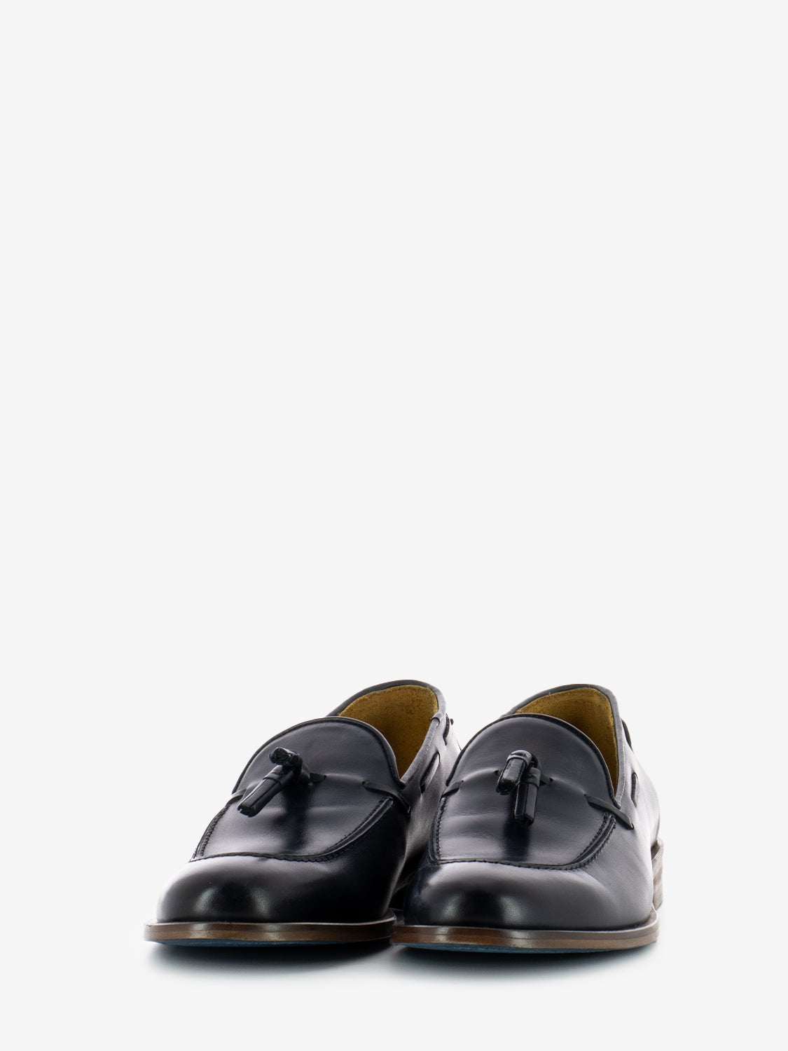 Leather moccasins with blue tassel