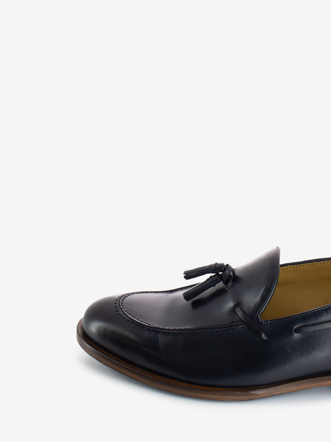 Leather moccasins with blue tassel