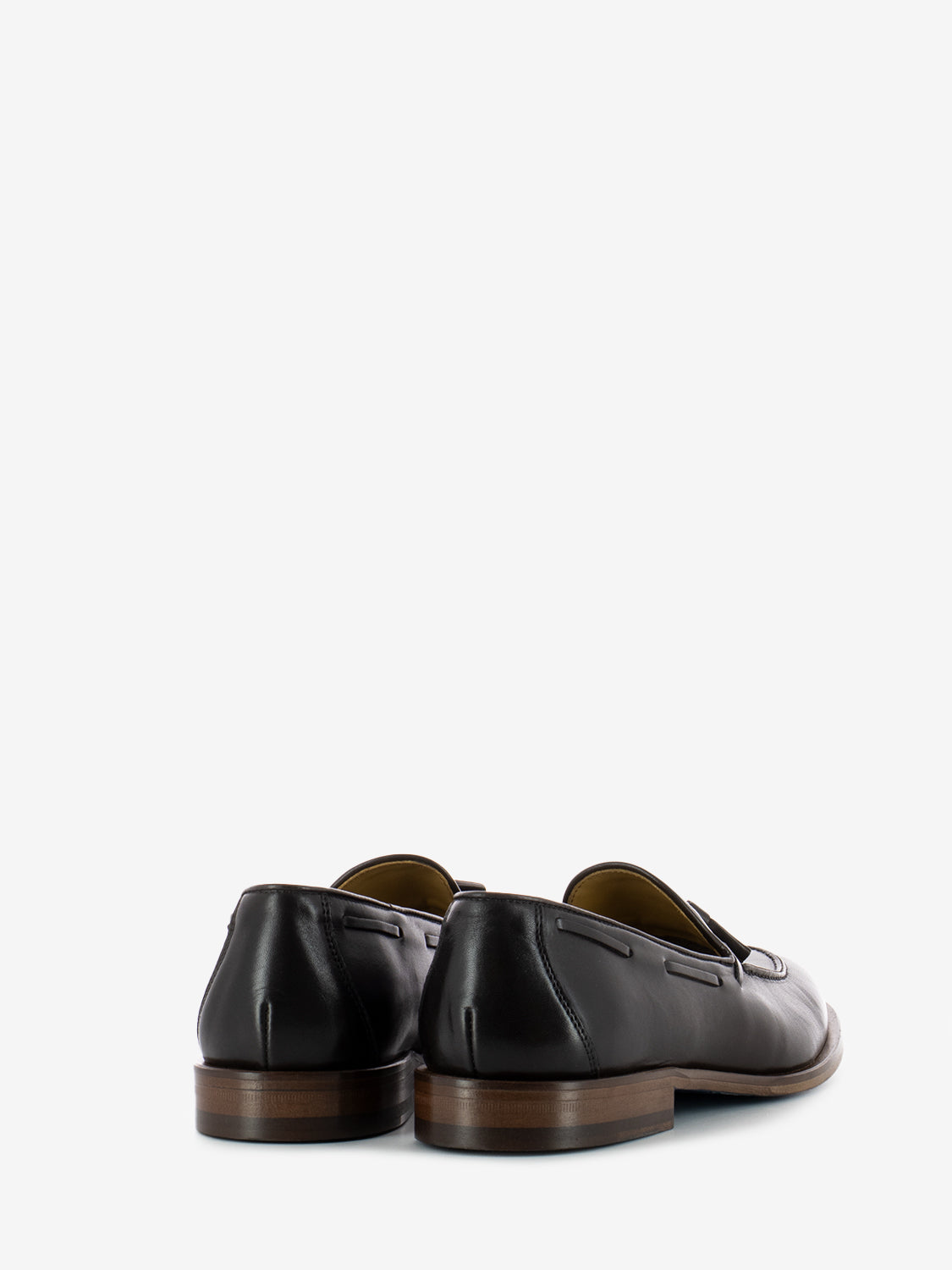 Leather moccasins with dark brown tassel