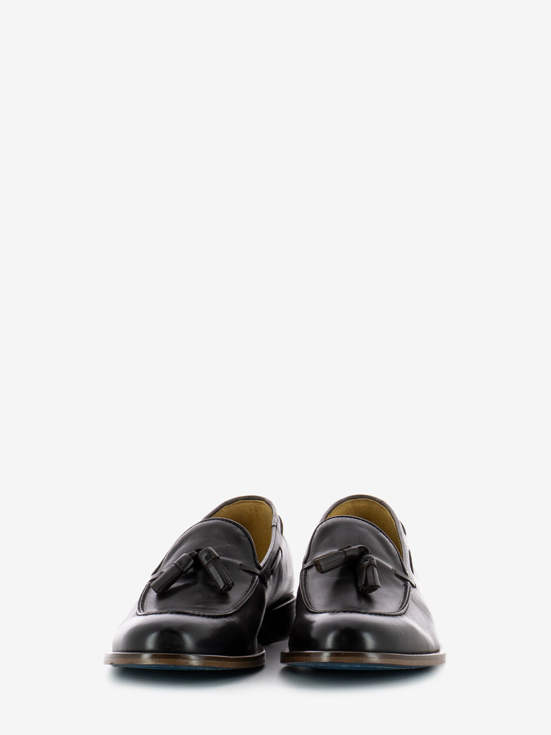 Leather moccasins with dark brown tassel
