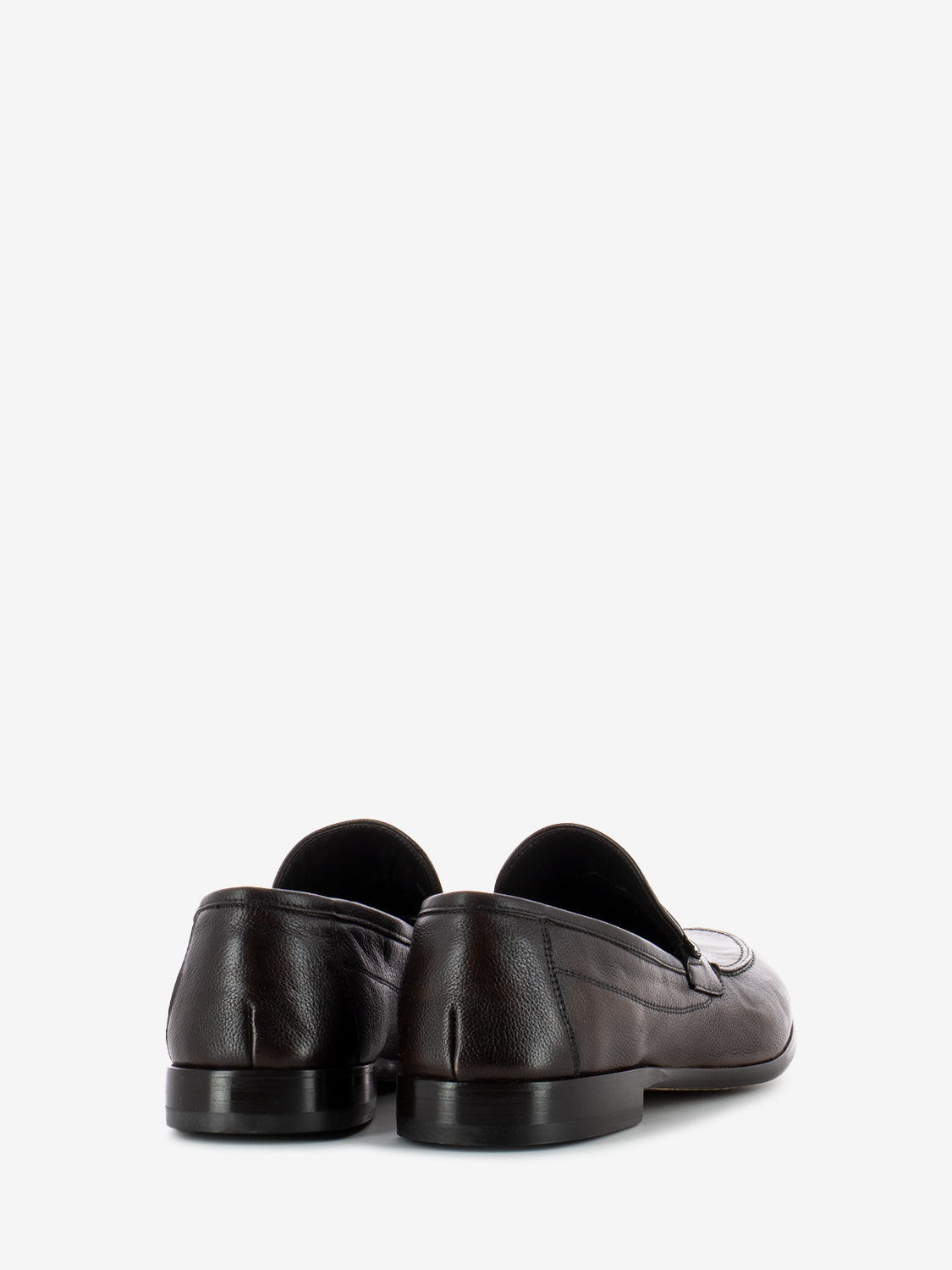 Moccasins in dark brown leather