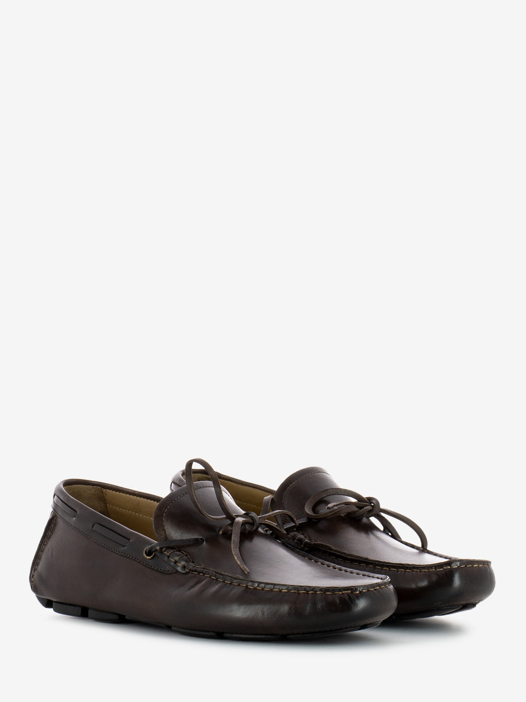 Moccasin with bow in dark brown leather