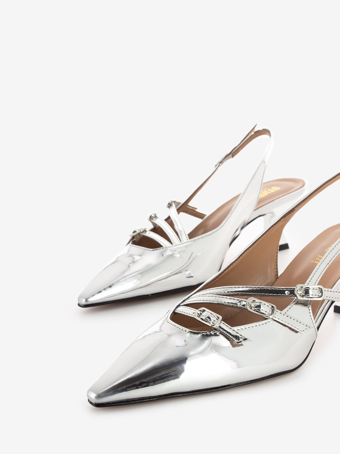 Slingback con cinturini in vernice argento