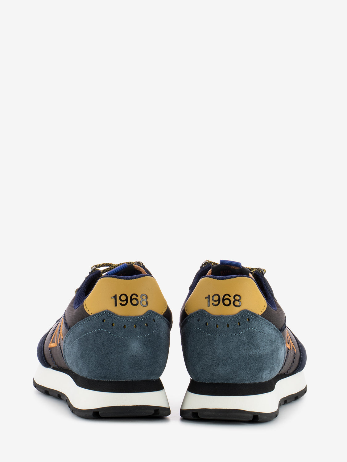 Tom Goes Camping brown sneakers
