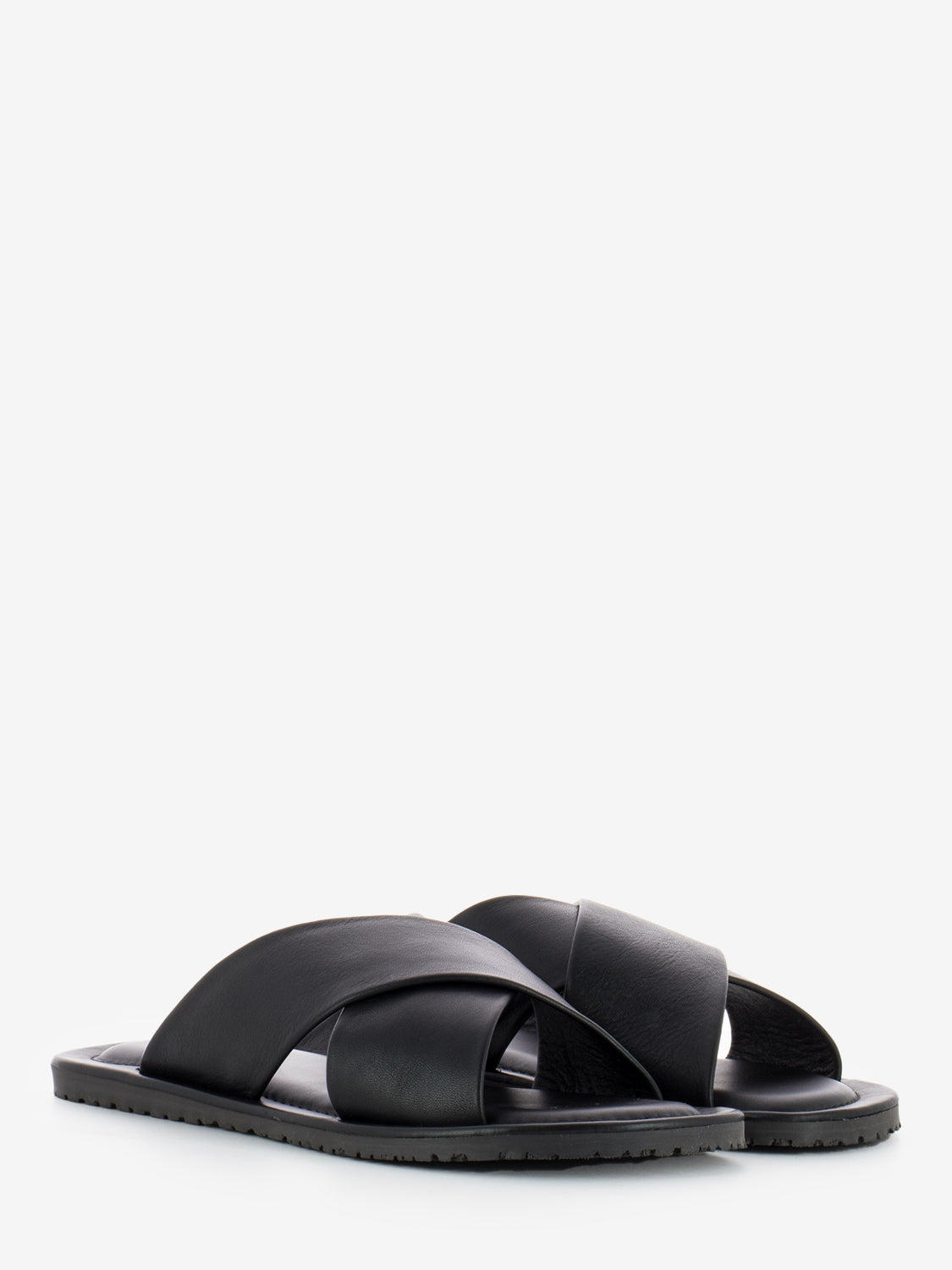 The Sandals Factory Black leather slippers with braided straps