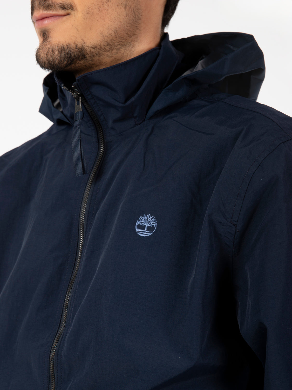 Water resistant dark sapphire bomber jacket