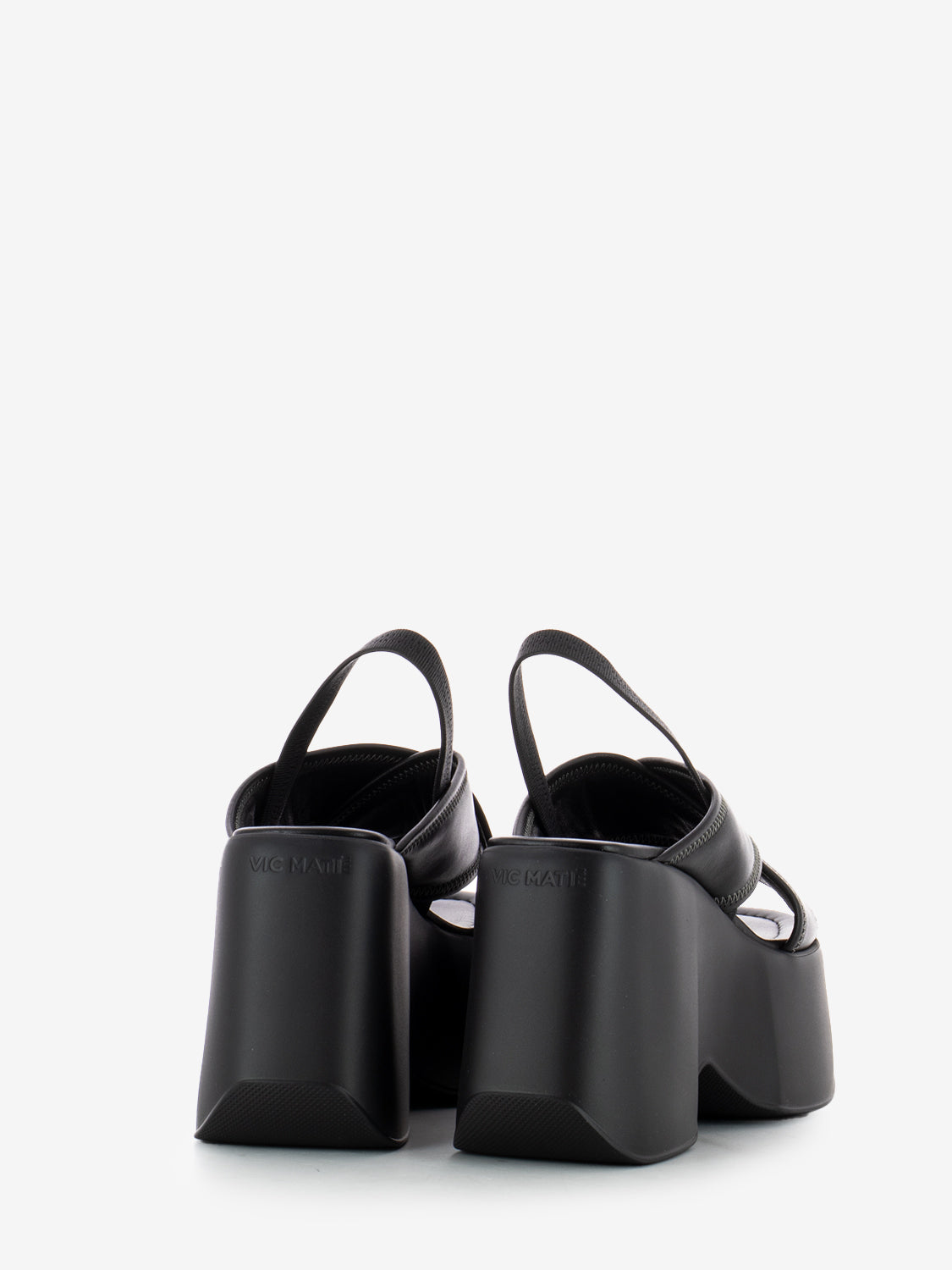 Sandali con zeppa fasce intrecciate in pelle nero