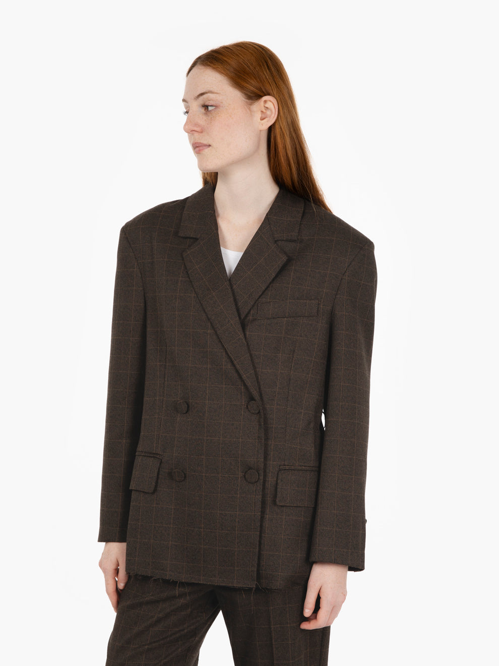 Check blazer with dark brown belt