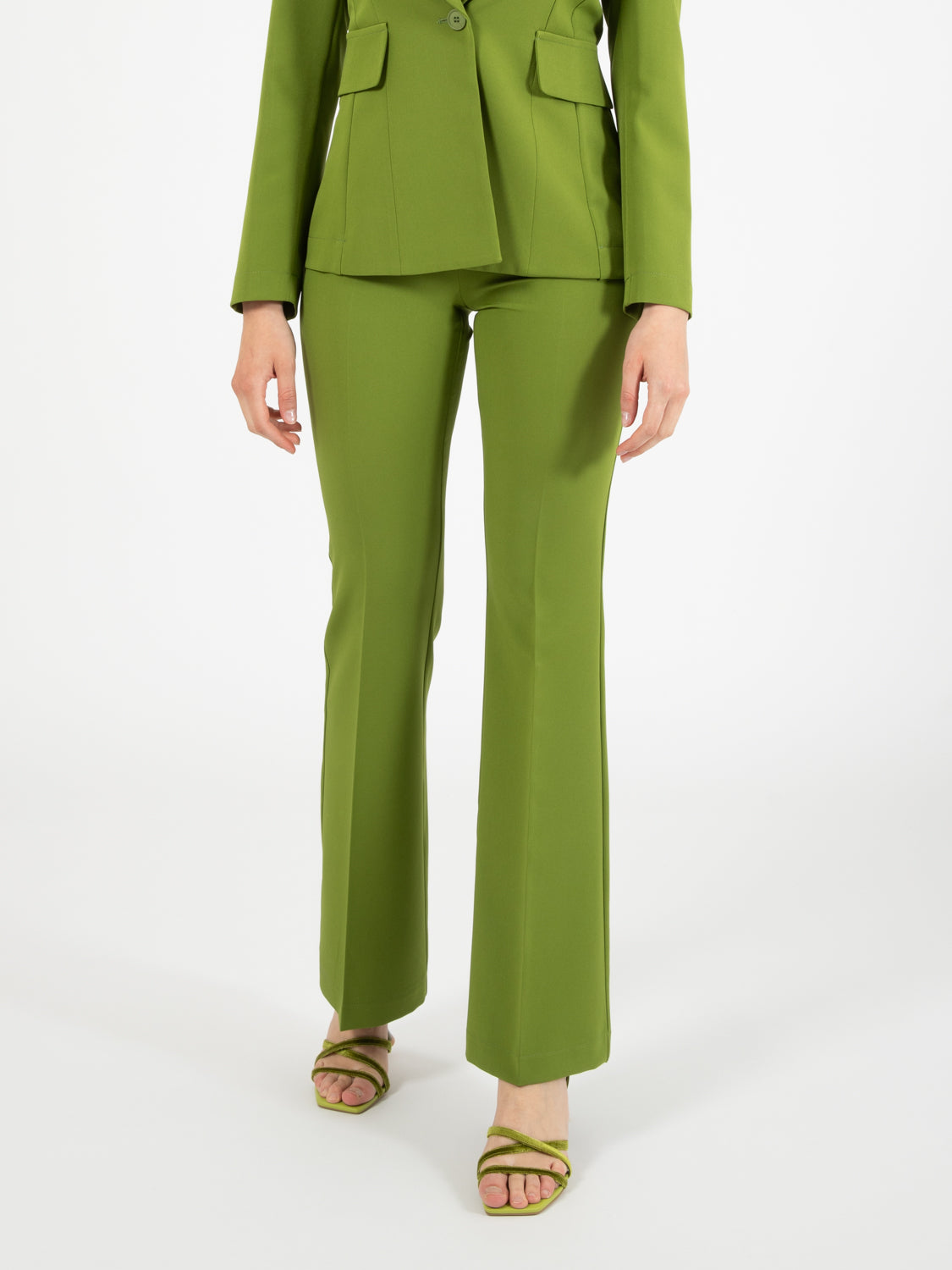 Green flared trousers