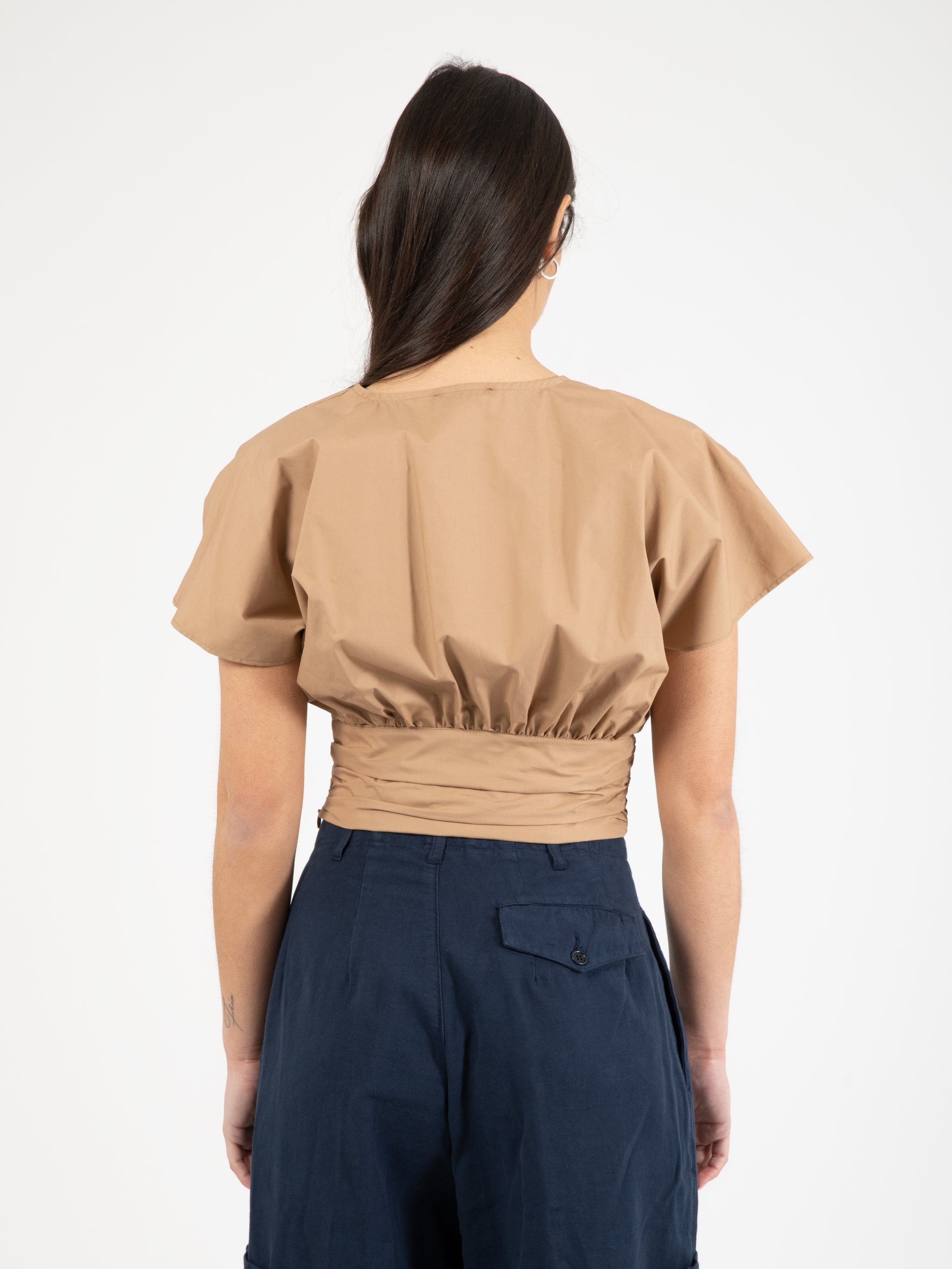 Blusa cropped pipistrello beige