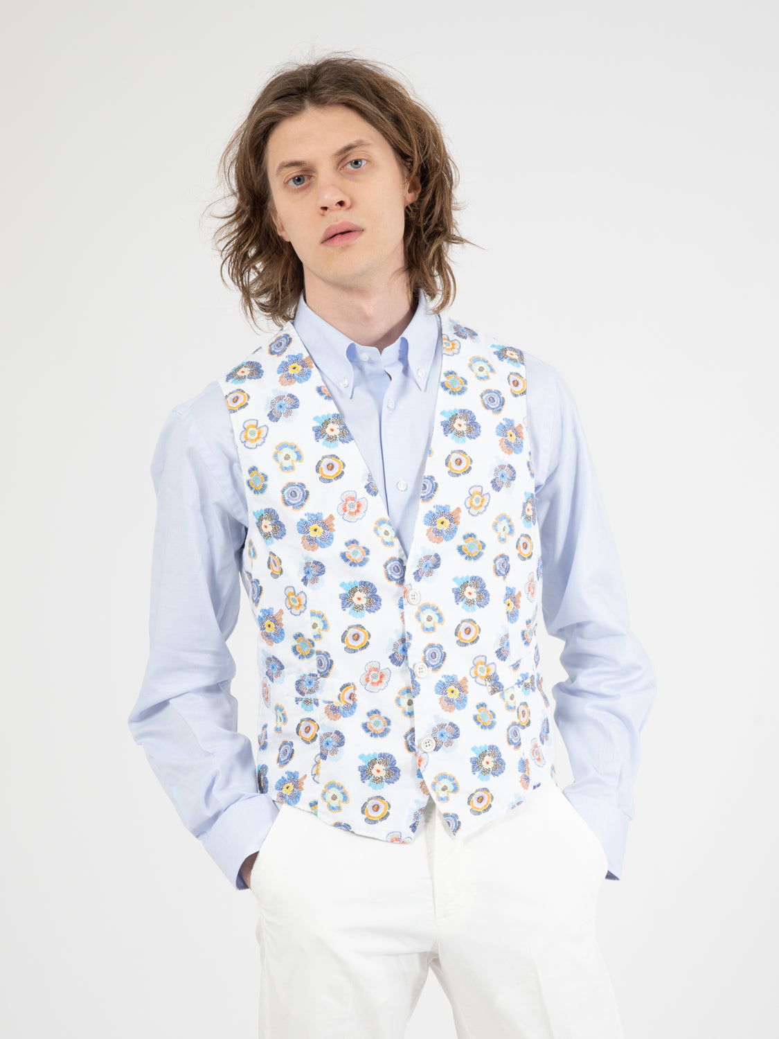 White/blue floral patterned vest