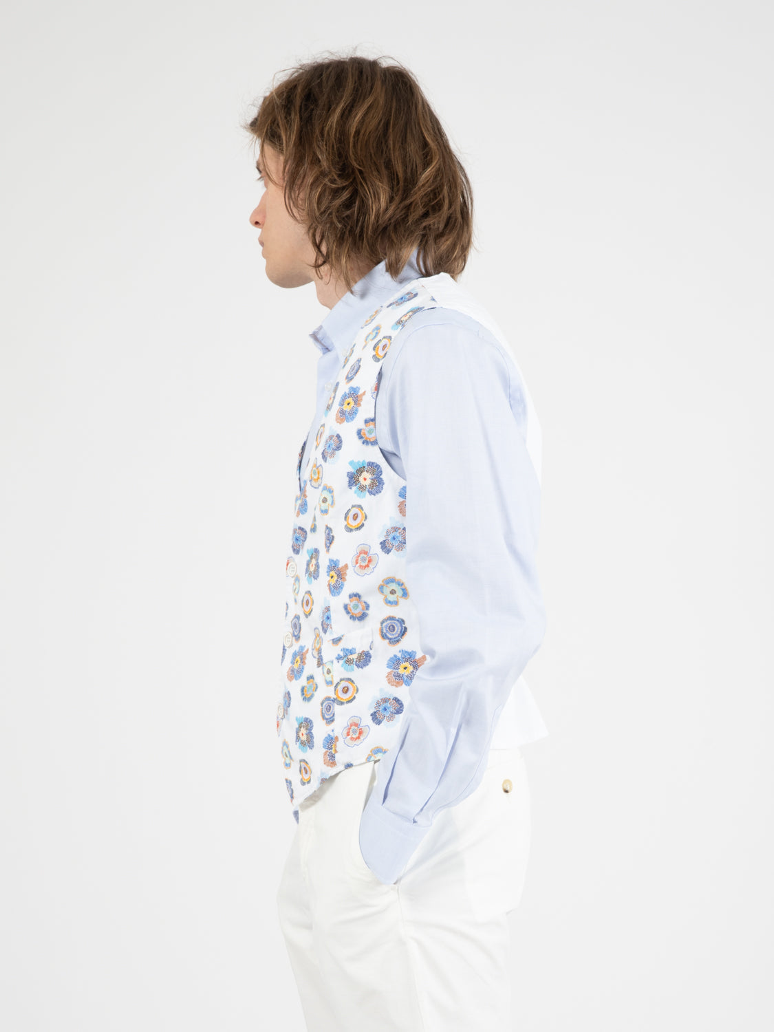 White/blue floral patterned vest