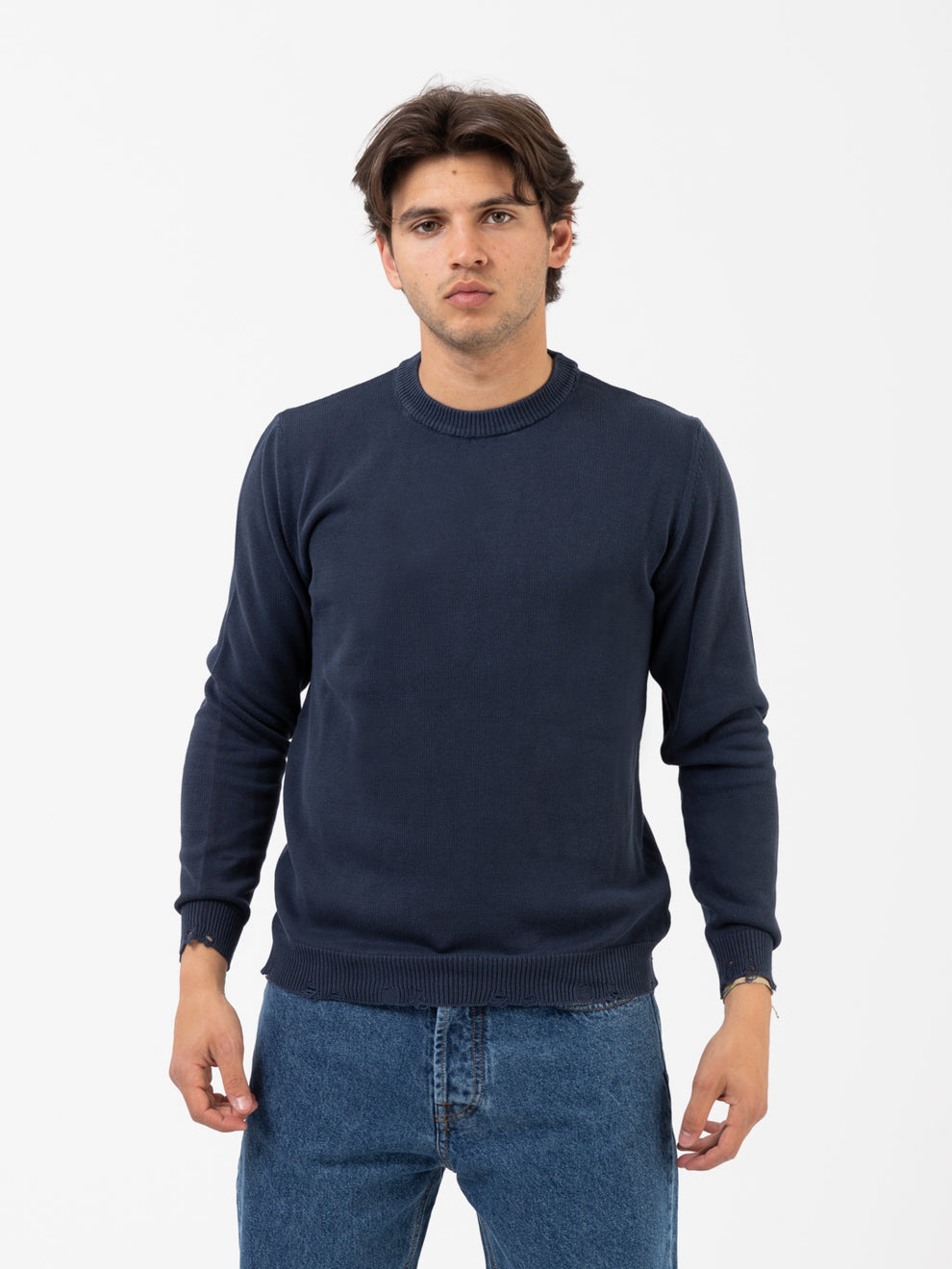 Dark blue jersey with soft old tears