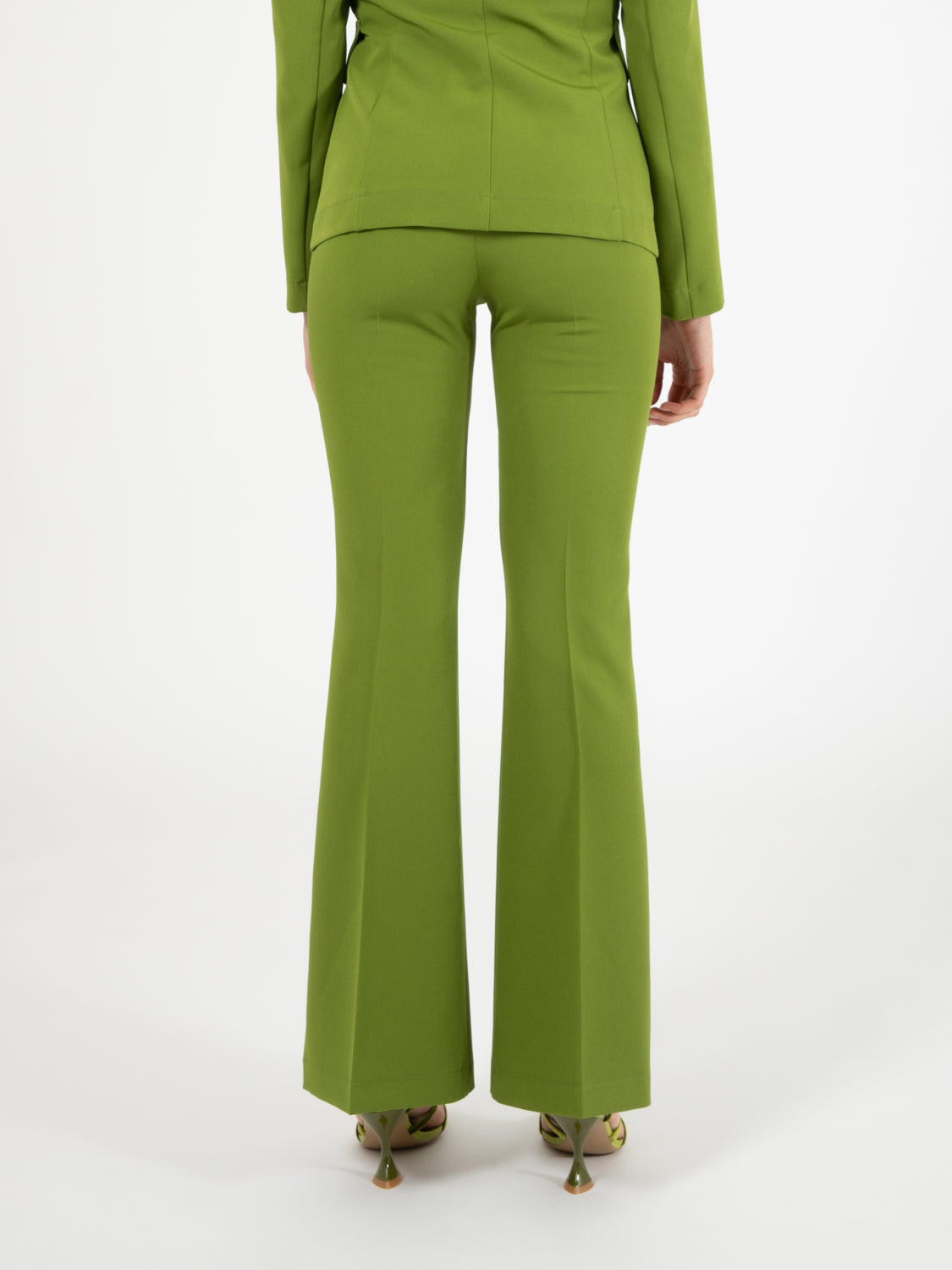Green flared trousers