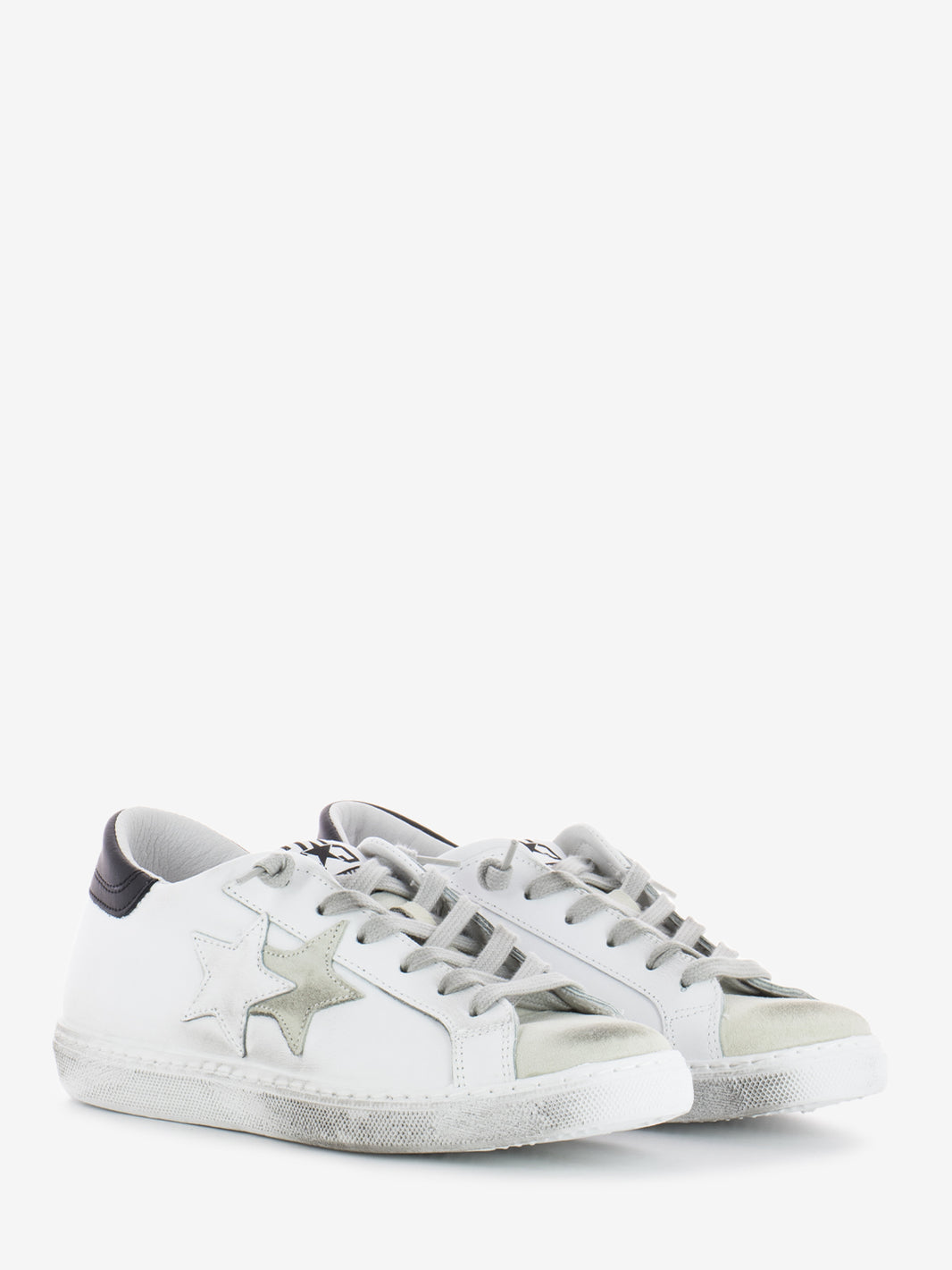 Low sneakers white leather / black details