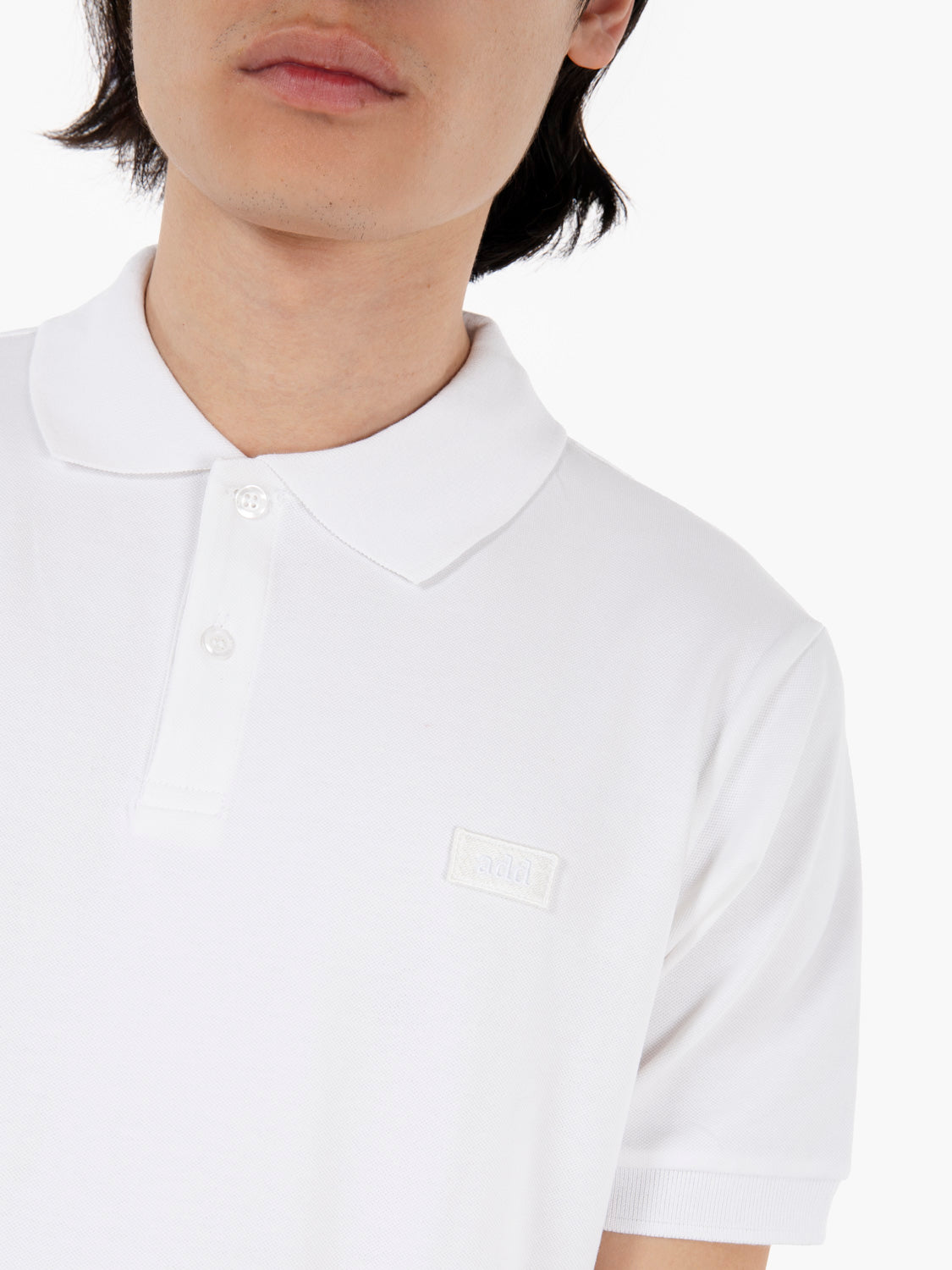 Polo con logo tono su tono white
