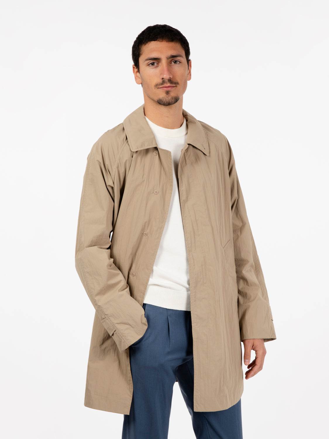 Beige multi-pocket trench coat