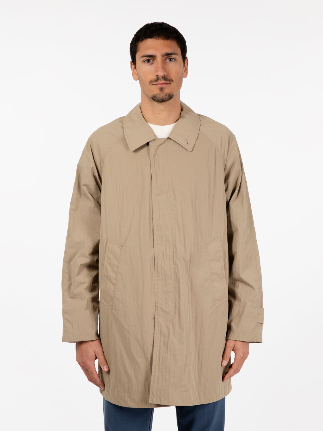 Beige multi-pocket trench coat