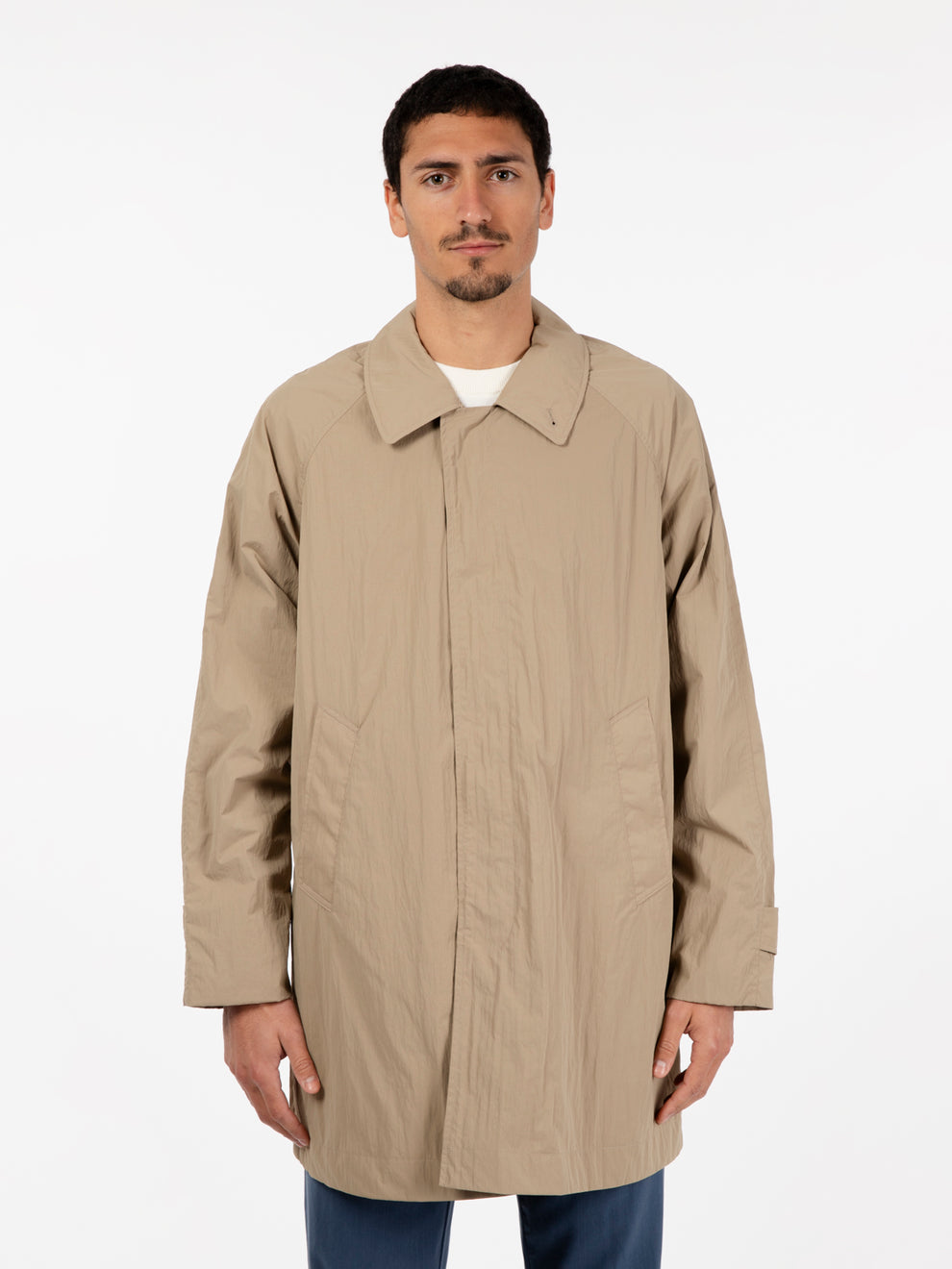 Beige multi-pocket trench coat