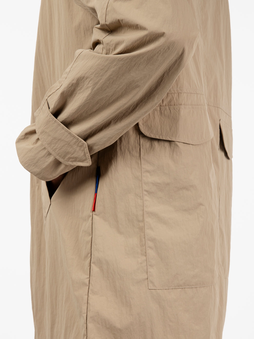 Beige multi-pocket trench coat
