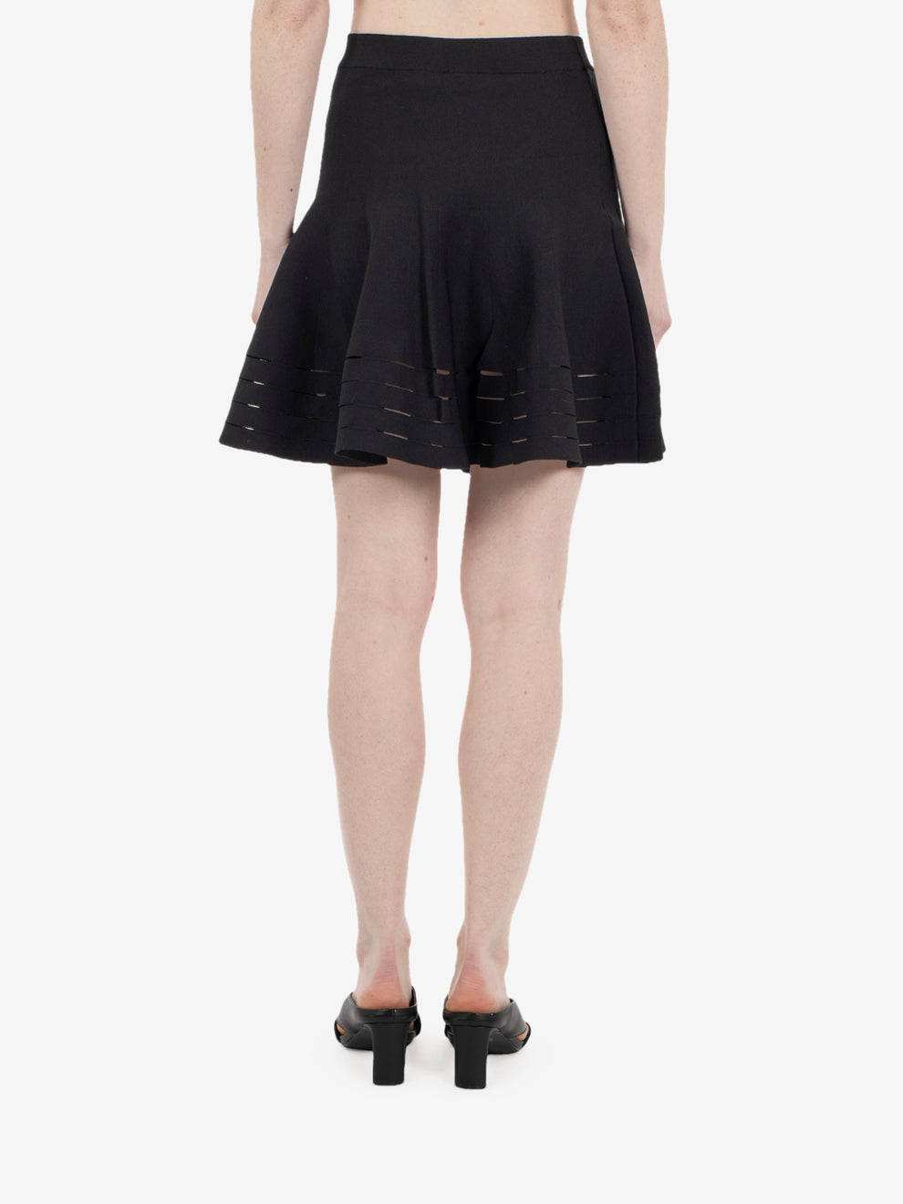 Black cut-out mini skirt