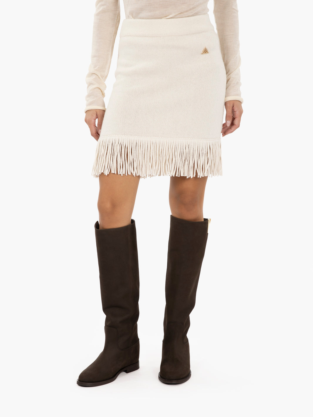 Miniskirt in plain knit with snow fringes