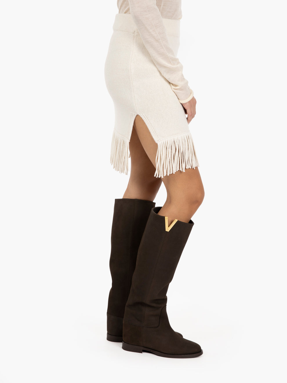 Miniskirt in plain knit with snow fringes