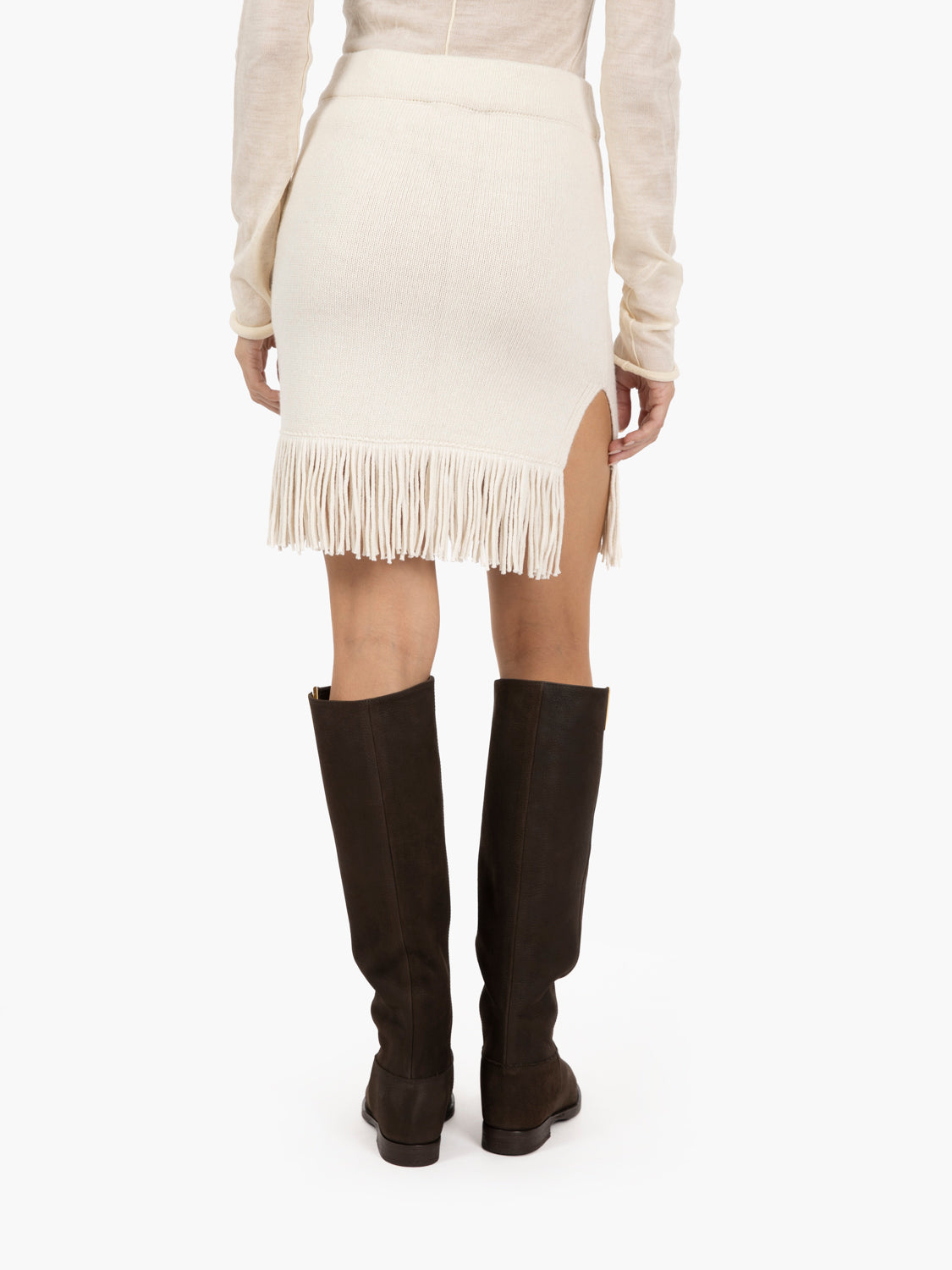Miniskirt in plain knit with snow fringes