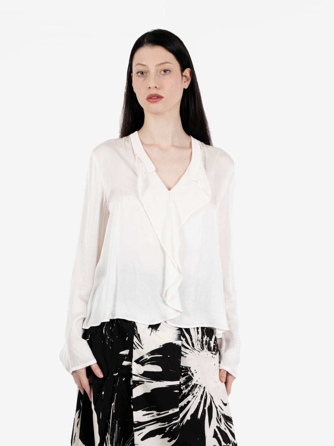 White ruffled blouse
