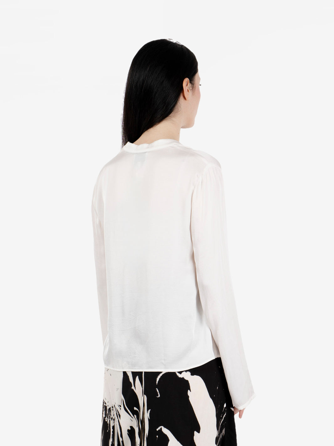 White ruffled blouse