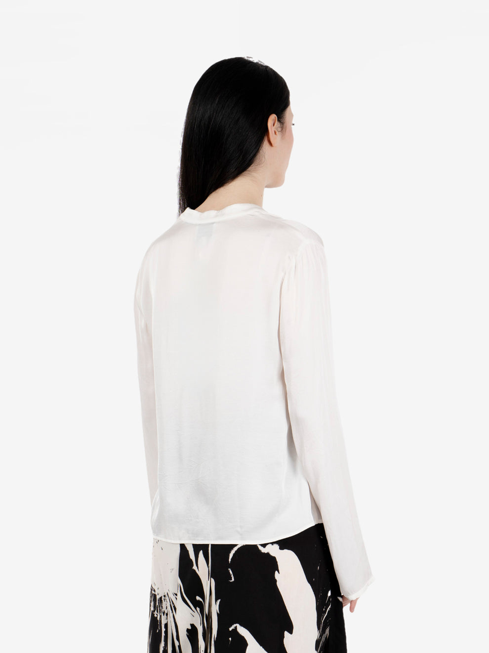 White ruffled blouse