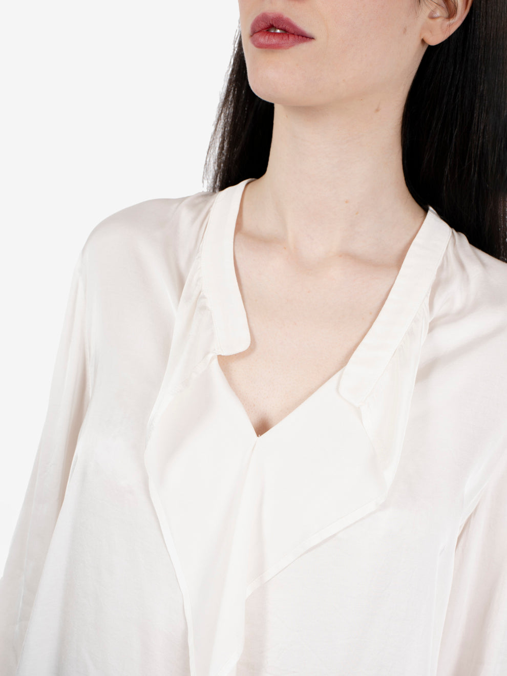 White ruffled blouse