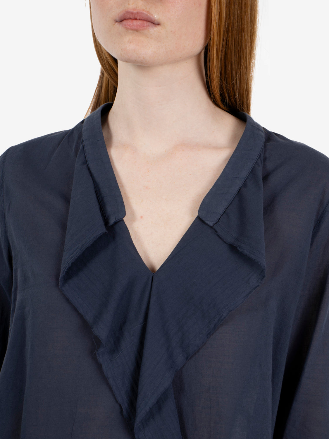 Blue muslin blouse with ruffles
