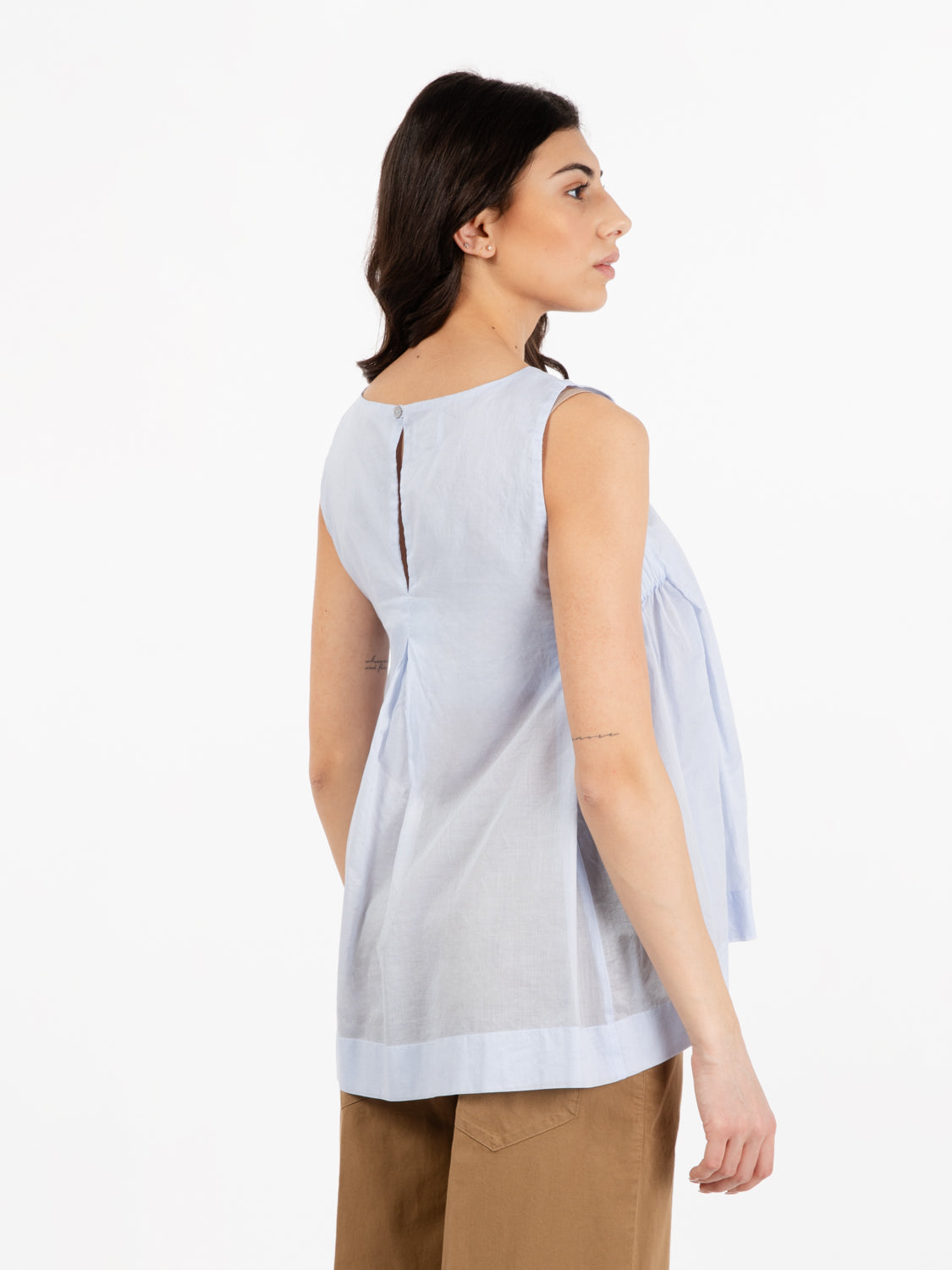 Light blue sleeveless blouse