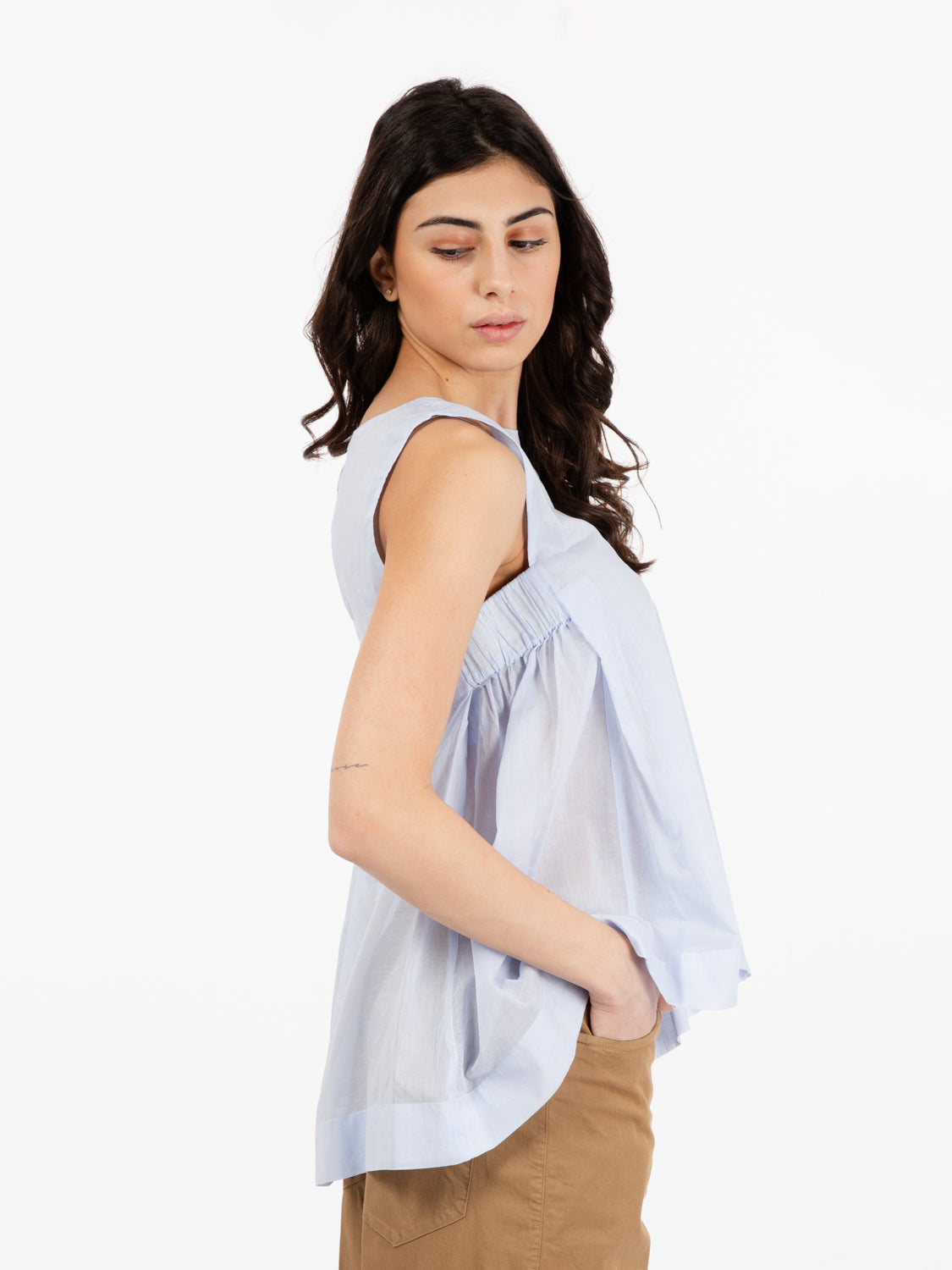 Light blue sleeveless blouse