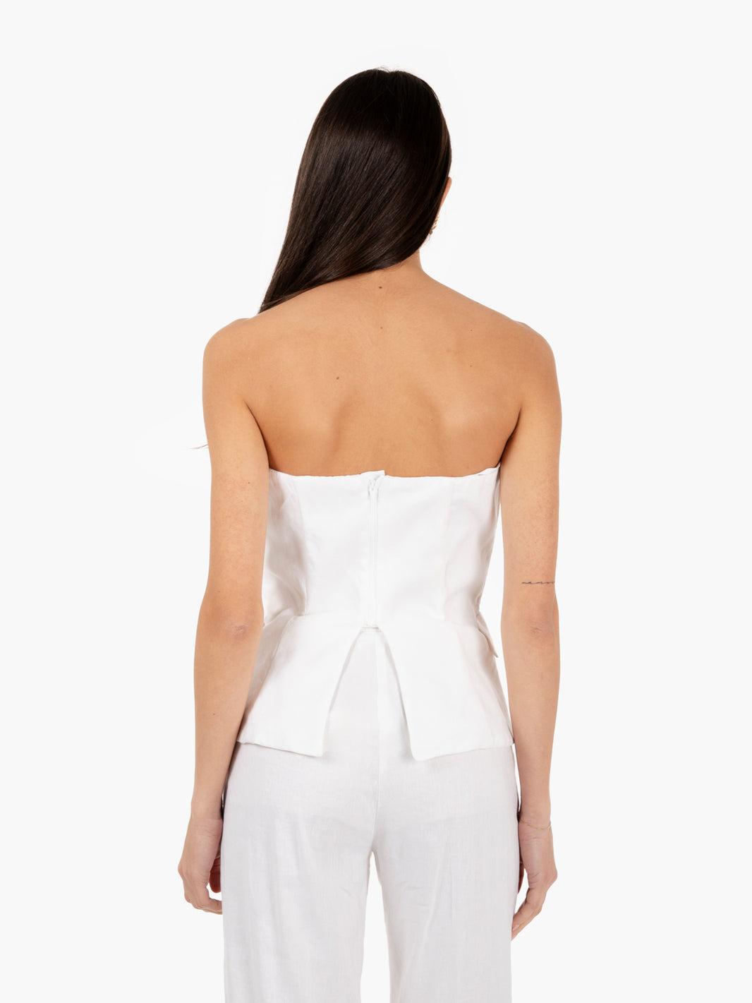 White sleeveless top