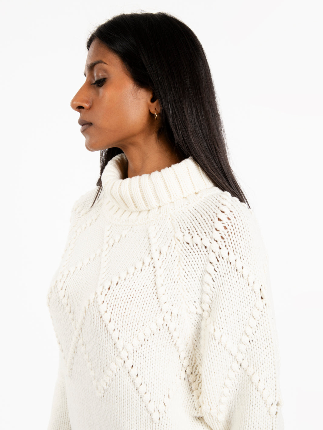 Maglia a collo alto in lana bianca