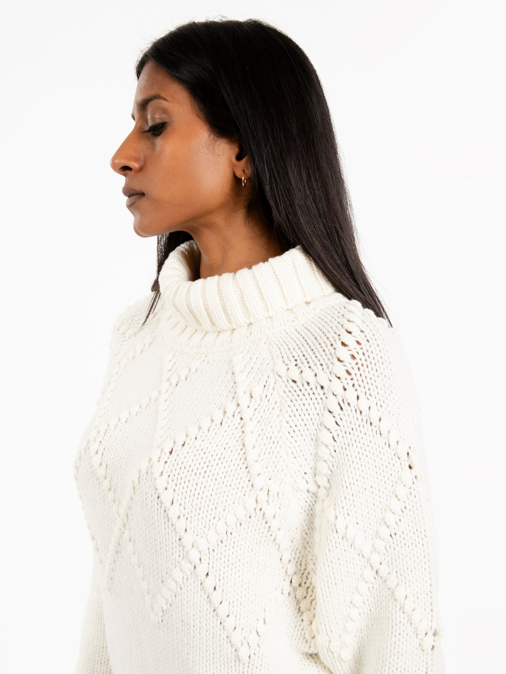 Maglia a collo alto in lana bianca